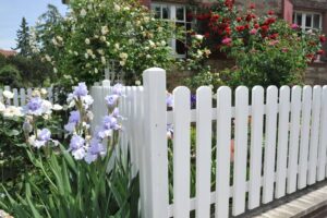 white painted picket fence